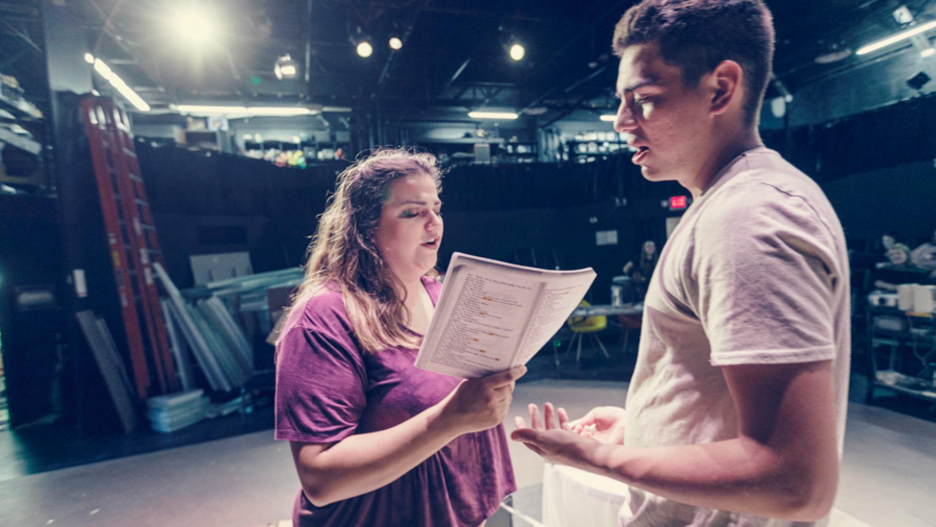 Students rehearsing for All In the Timing
