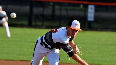 Kyle Fieger throws baseball toward batter
